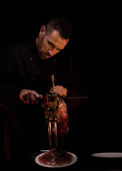 

professional Iberian ham cutter making a still life and cover of Iberian ham, cheese and bread