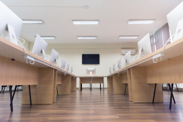 High school computer lab classroom is still empty after months of no classes due to the Covid-19...