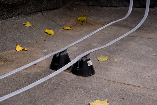 Roof-mounted earthing strip. Close-up.