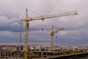 Tower cranes at a construction site.