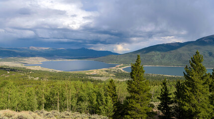 Summer at Twin Lakes - A panoramic overview of Twin Lakes on a stormy Summer evening. Twin Lakes, Leadville, Colorado, USA.