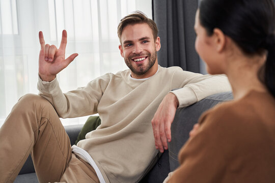 Dumb man communicating nonverbal