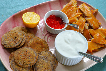 Platter of fresh buckwheat blini pancakes
