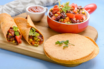 Tacos - delicious tortillas with meat and vegetables