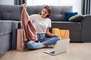 Girl looking at her purchase