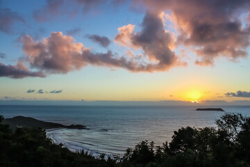 Sunrise in the Pacific Ocean behind an island - Mole Beach - Florianópolis, Santa Catarina, Brazil
