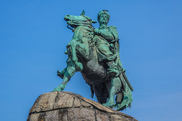 Fototapeta na wymiar Monument to famous Ukrainian Hetman Bohdan Khmelnitsky (built in 1888) on Sofia square in Kyiv (Kiev), Ukraine. {Inscription: Bohdan Khmelnitsky, 1888}