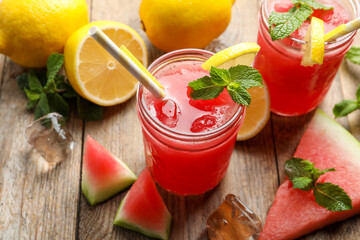 Delicious fresh watermelon drink on wooden table