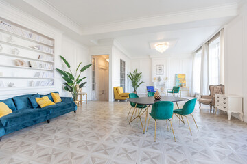 modern and very stylish interior design of large studio apartment with fashionable furniture with...