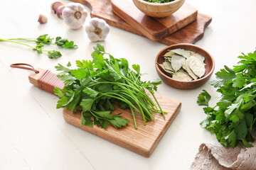 Composition with fresh parsley on table