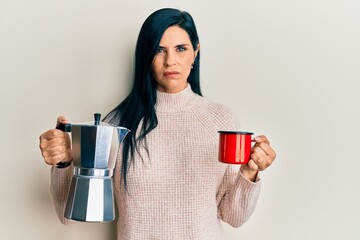 Young caucasian woman drinking italian coffee skeptic and nervous, frowning upset because of problem. negative person.