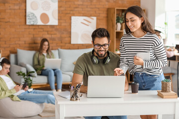 Students with modern devices studying online at home