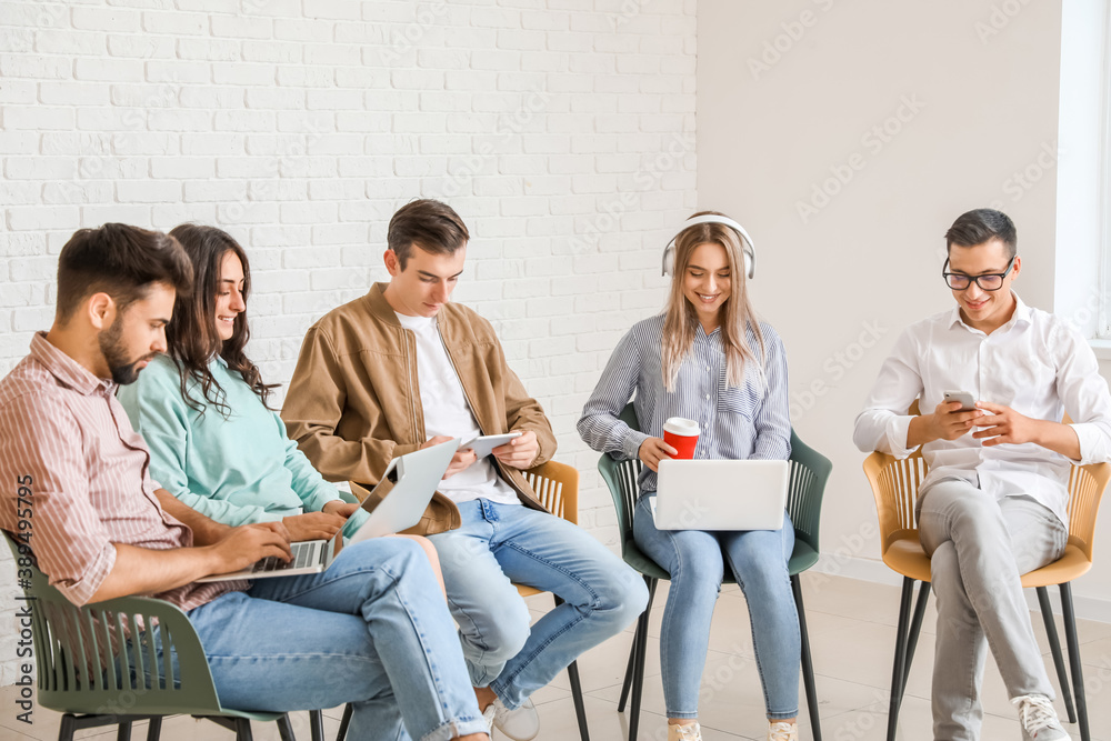 Canvas Prints Students with modern devices studying online indoors