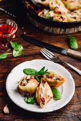 Pasta stuffed with ground beef, spinach and cheese