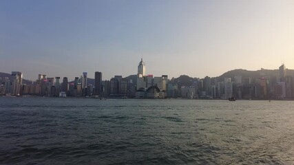 Hong Kong, China, 01 November 2020: Hyperlapse of people walking in Tsim Sha Tsui water front at sunny day
