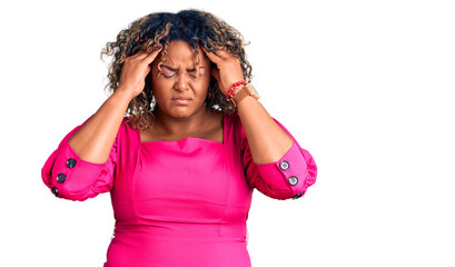 Young african american plus size woman wearing casual clothes suffering from headache desperate and stressed because pain and migraine. hands on head.