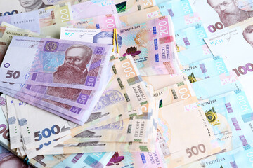 Closeup view of Ukrainian money as background. National currency
