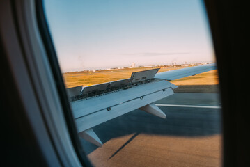 Wing of an airplane landing in Kastrup, Copenhagen airport.