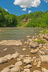 River Cutting Through Sandstone Cliffs