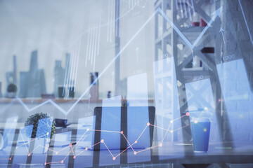Naklejka premium Double exposure of stock market graph drawing and office interior background. Concept of financial analysis.