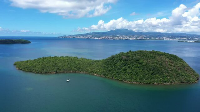 Large aerial view of Gros &icirc;let or &Icirc;let Mandoline with Fort de France bay and city in background Martinique 