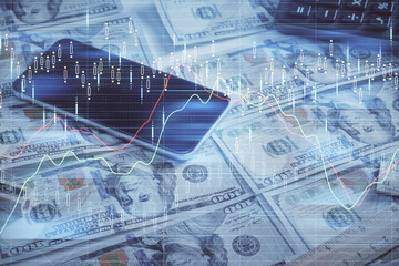 Fototapeta premium Double exposure of forex graph drawing over us dollars bill background. Concept of financial markets.