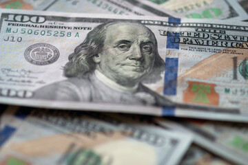 US fiat money pile, hundred dollar bills with Franklin closeup - obrazy, fototapety, plakaty