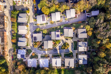 Aerial top down view of contemporary, modern duplex multistory houses, in a regentrified...