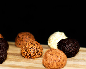 Belgian chocolate truffle on dark background close up - Brazilian brigadeiro