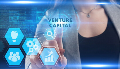 Business, Technology, Internet and network concept. Young businessman working on a virtual screen of the future and sees the inscription: Venture capital