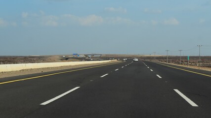 Driving on highway in the desert from Medina to Jeddah, Saudi Arabia, KSA