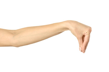 Hand picking, holding, grabbing or reaching. Woman hand gesturing isolated on white