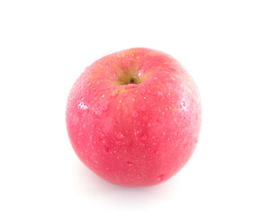 A red apple with water drops on white background