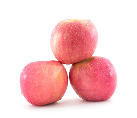 Three stacked red apples on white background