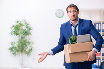 Young man being fired from his work