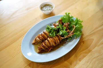 Deep fried squid with fish sauce, Thai food recipe.