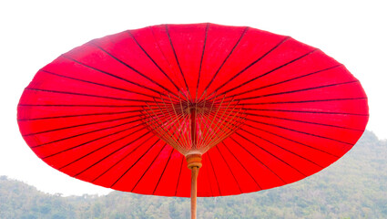 Red umbrella with blue sky and bright atmosphere