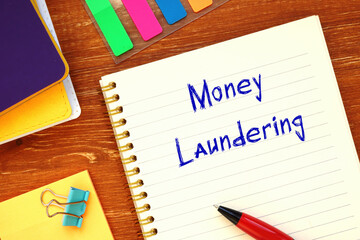 Money Laundering sign on the piece of paper.