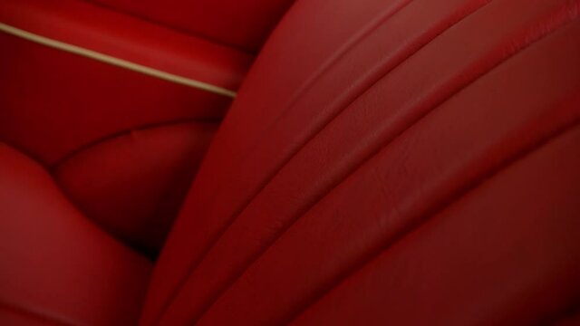 This is a 4k 60fps slow motion shot of the red leather seats of a trabant 600.