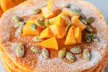 Tasty pumpkin pancakes, closeup view