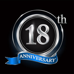 18th anniversary logo with silver ring and blue ribbon.