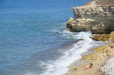 waves crashing on rocks