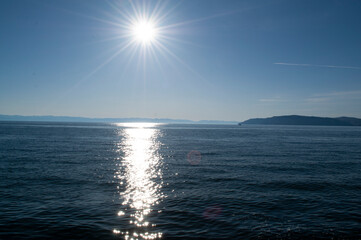 Obraz premium Baikal lake fresh water flora shore reserve Russia Irkutsk park island Sky clouds clear Olkhon rocks trees embankments sand bay lagoon stones mountains hills horizon line panorama autumn water waves t