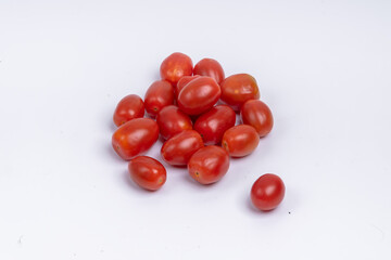 Group of cherry tomatoes isolated on white background