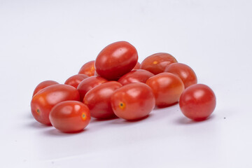 Group of cherry tomatoes isolated on white background