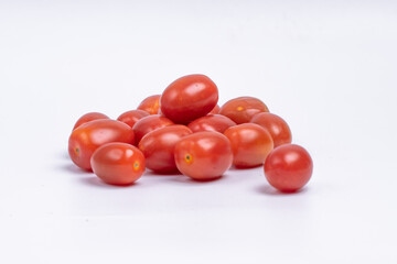 Group of cherry tomatoes isolated on white background