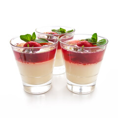 Milk Jelly with strawberry in the glass topped mint leaf