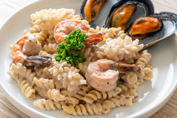 spiral pasta mushroom cream sauce with seafood