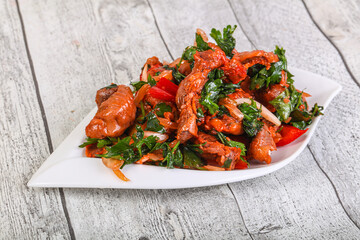 Marinated chicken breast slices with cilantro