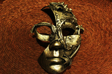 Mask on a braided surface.